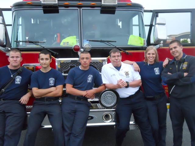 The crew from Co. 10 pose after giving tours of the fire engine
Save Your Heart for Love - May 2010